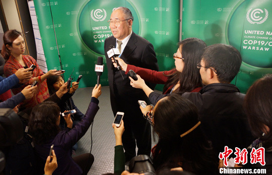 中方总结气候大会两方面成果吁发达国家兑现承诺